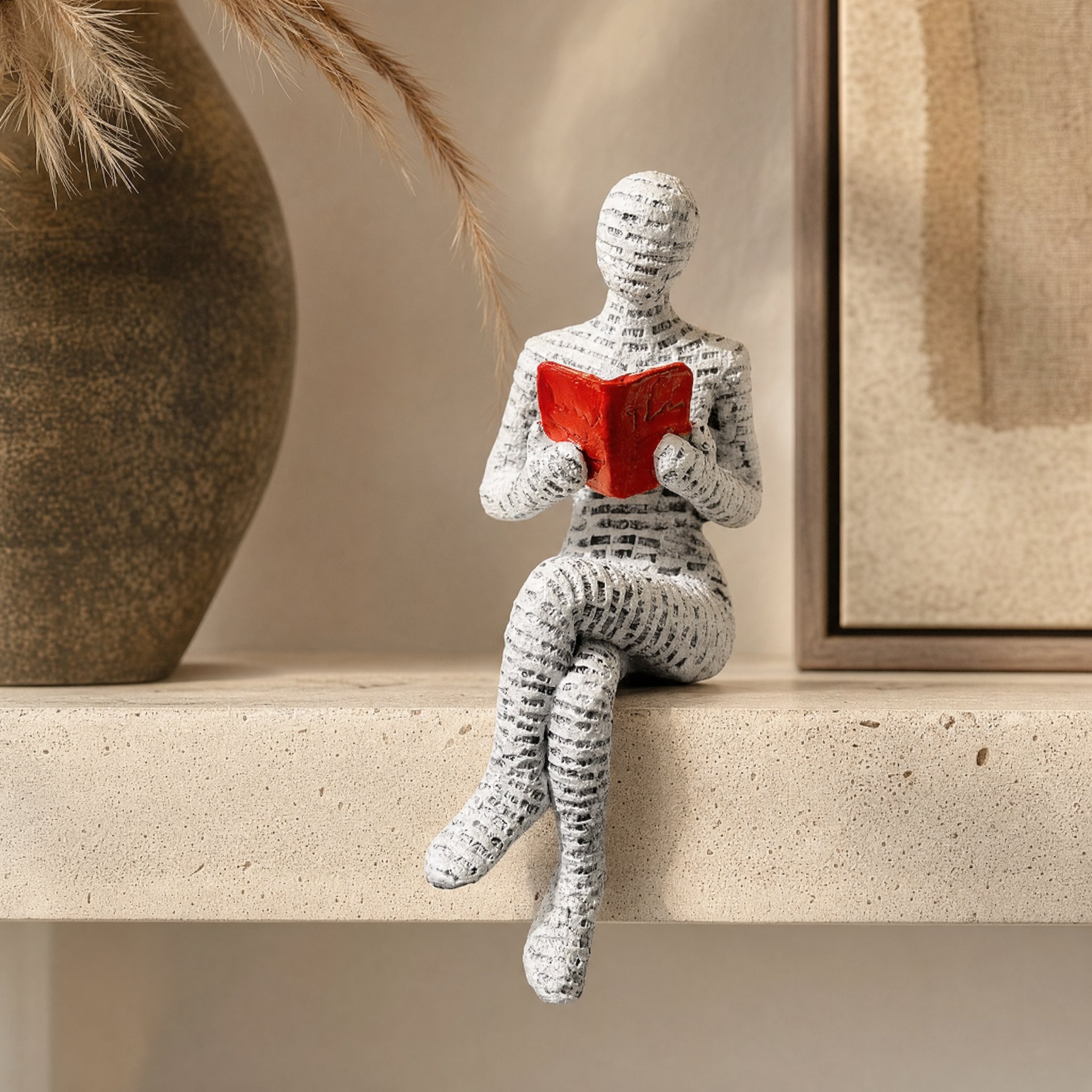 Resin abstract character figurine styled on a shelf in a warm interior